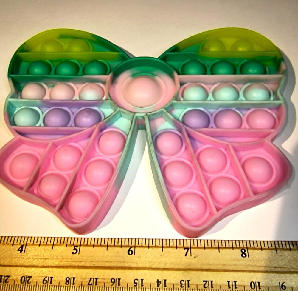 1785.  Sensory Fidget Toys Silicone Bubbles Bow Pink